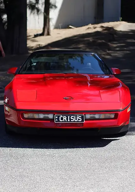 Front on shot of a red Chevrolet C4 Corvette